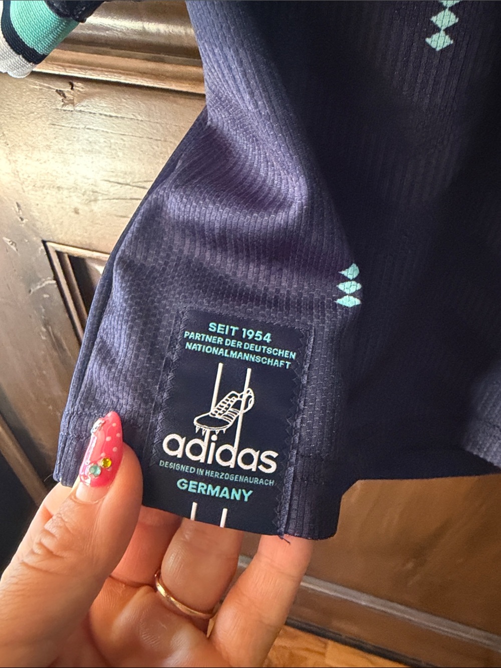 adidas Women's Navy GERMANY Soccer Jersey with Turquoise Trim - Picture 5 of 6